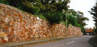 the boundary wall of Belhaven Manor in North Street