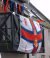 Flag of the RNLI on a house at Dunbar Harbour, Lifeboat Day 2002